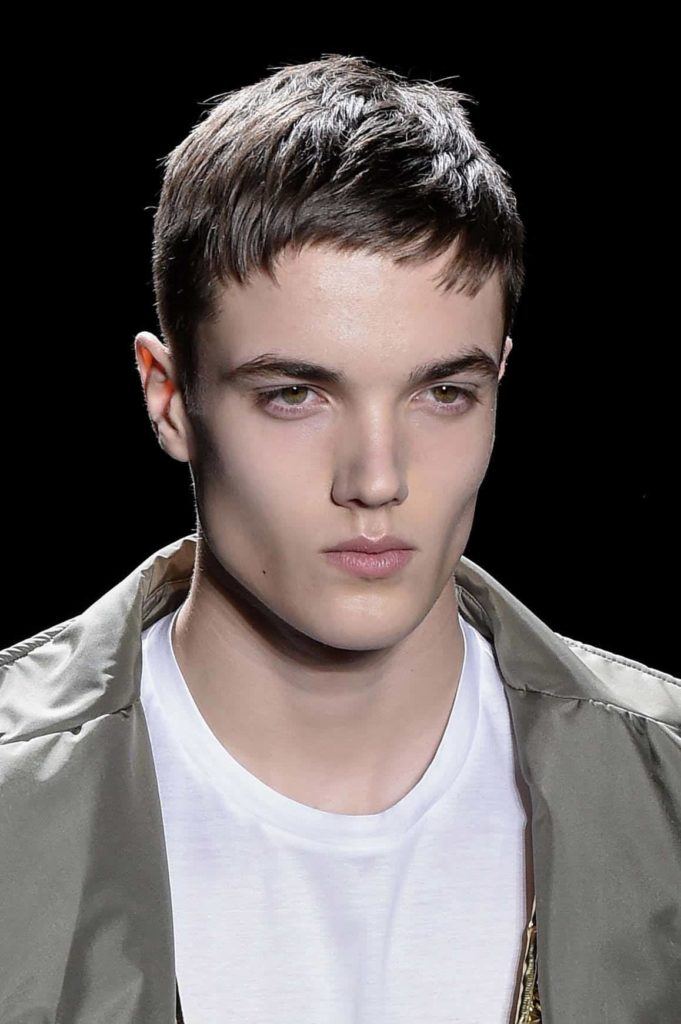 model wearing one of the men's short hairs for summer