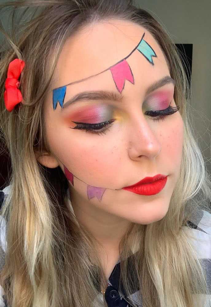 Cold colors were chosen to compose this June party make-up with smoky shade and painted pennants 