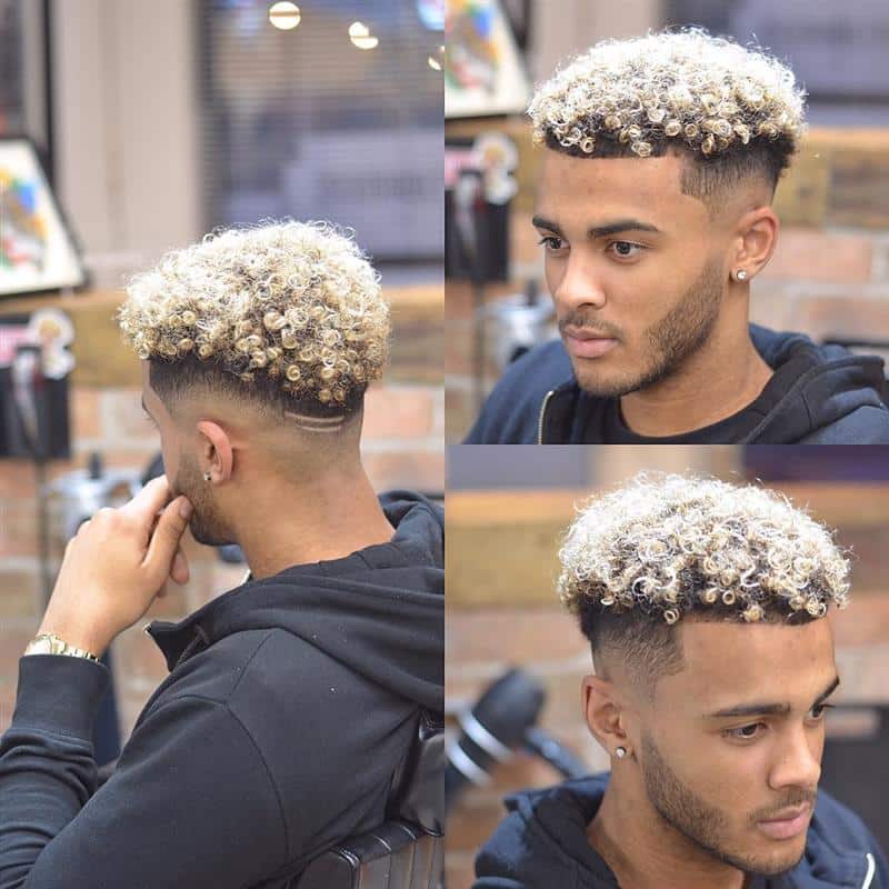 male curly haircut with highlights