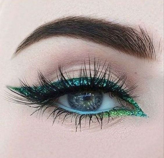 Green makeup with glitter