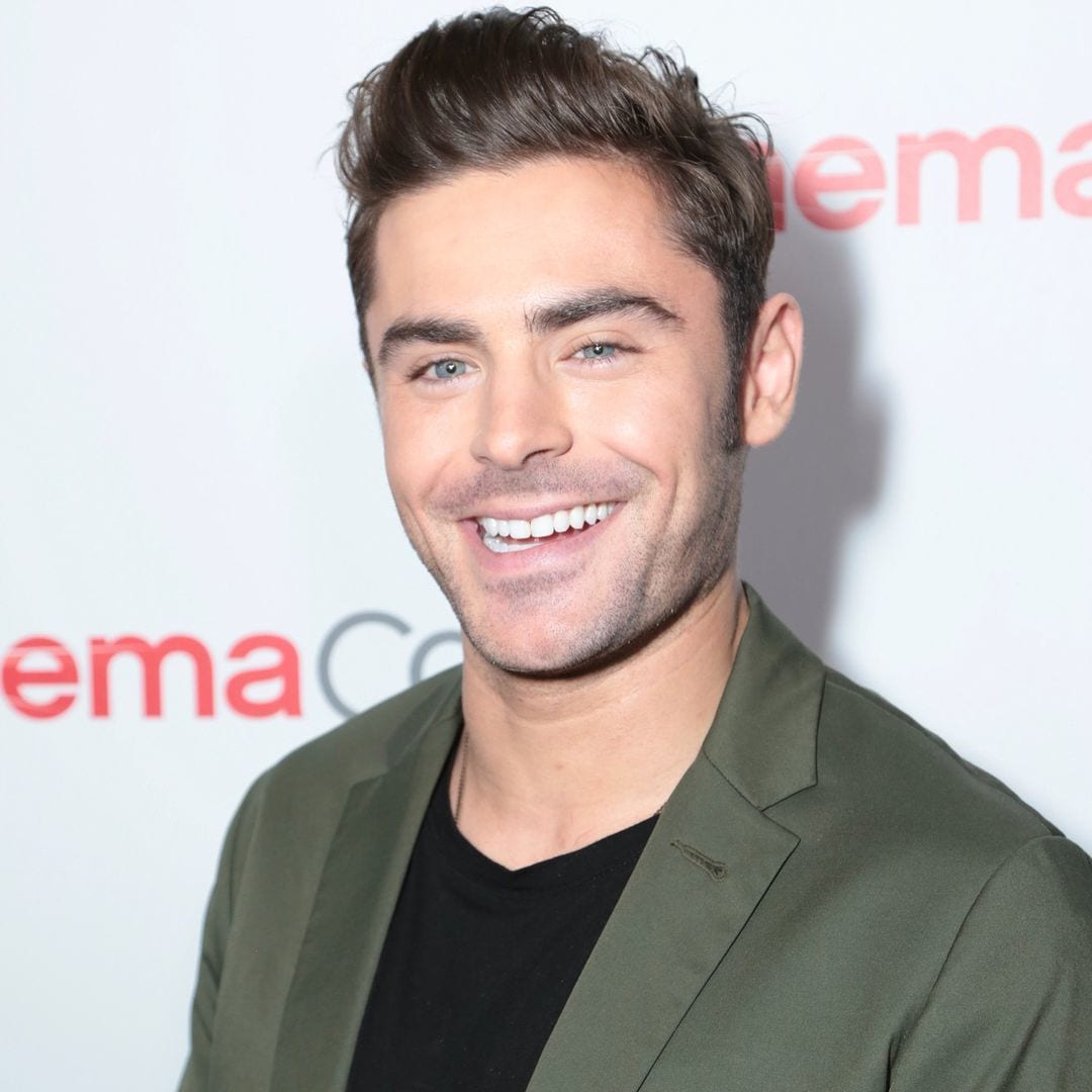 Zac Efron with male haircut with topknot for round face