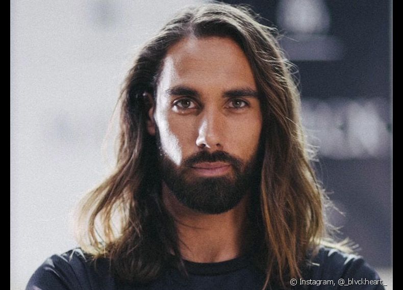 Long-haired men can modernize their look by adopting a new cut without giving up long hair