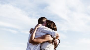 evangelical young couple embracing
