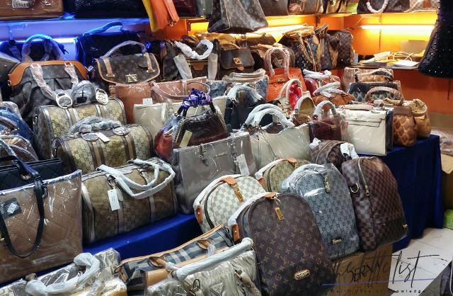 Is it illegal to buy fake purses from China?