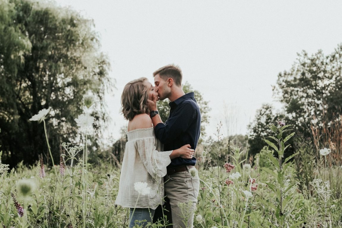 couple kissing in flower field, couple Tumblr photo captions