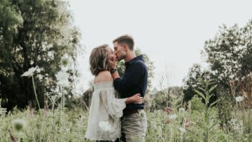 couple kissing in flower field, couple Tumblr photo captions