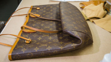 What causes Louis Vuitton canvas to crack?