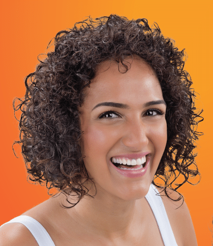 Smiling woman with short curly haircut n5 from cuts book.