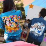 Montage showing, on one side, a woman with her back wearing a jacket with a colorful design that portrays characters from the Grey's Anatomy series.  On the other, Woman on the back wearing a jacket with a colorful design depicting characters from the movie Birds of Prey
