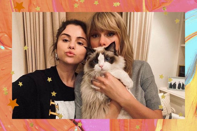 Selena Gomez pouting beside Taylor Swift, who is holding a cat