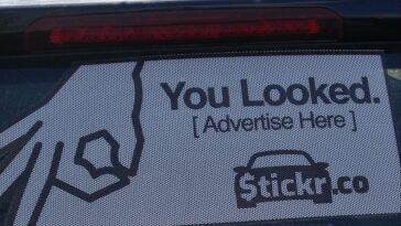How do I get paid to stickers on my car?