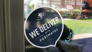 Why did Uber buy Postmates?