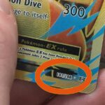 How do I find out my Pokemon card number?